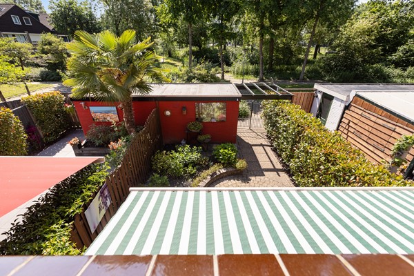 Foto - Te koop: Goed onderhouden tussenwoning in rustige woonwijk!